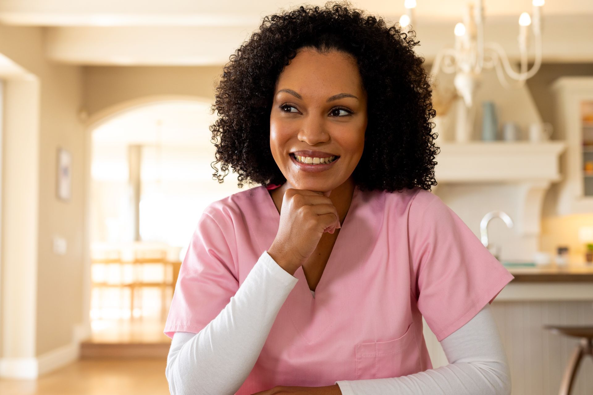 nurse in patient home helping them 