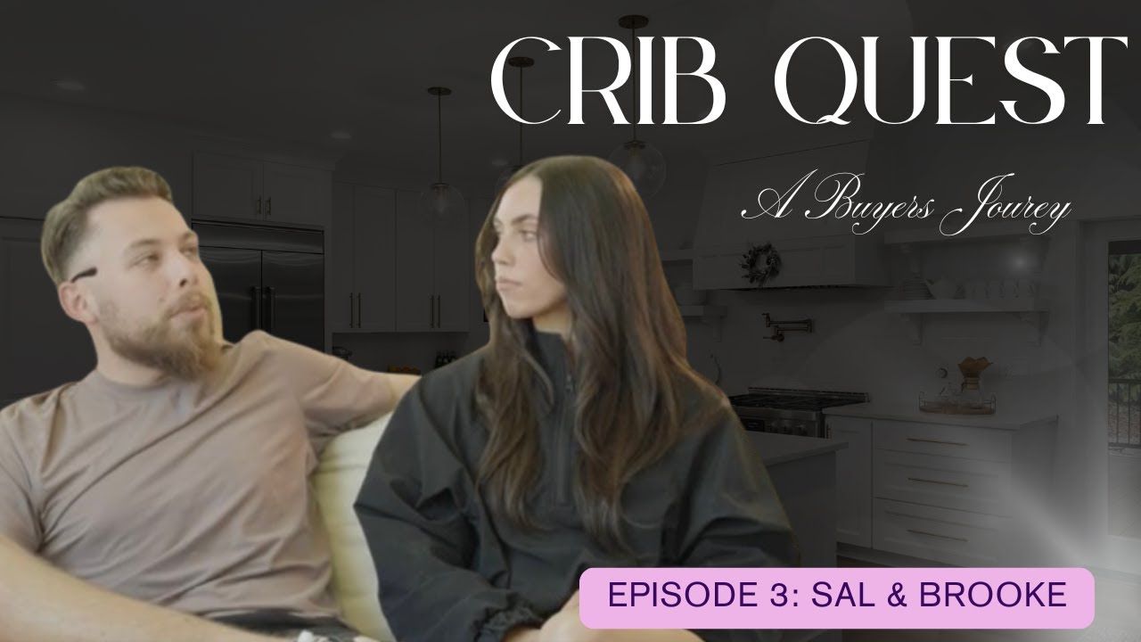 Man with beard and woman in front of a kitchen.