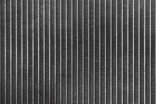 A close up of a radiator with a striped pattern.