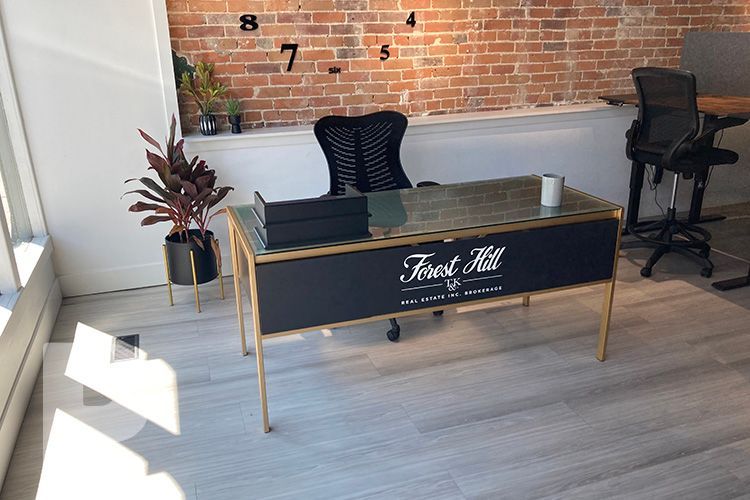 A black and gold desk with the word trust on it