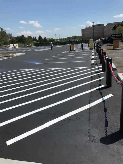 A parking lot with a lot of white lines on it