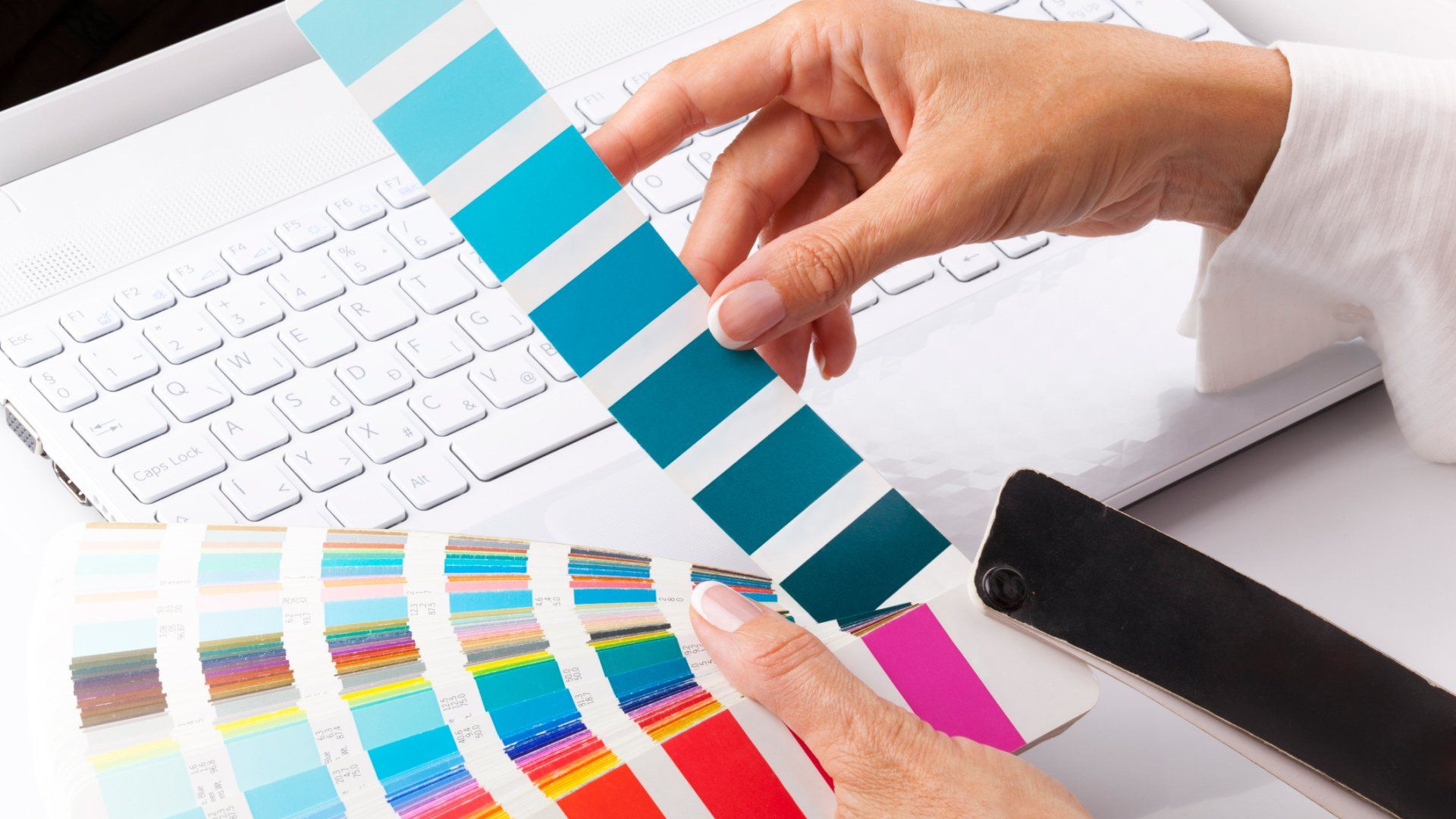 Graphic Designer Selecting Colors – Tecumseh, MI – D Printer Inc.