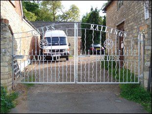 For a wide range of gates and railings, call TME Fabrication & Welding Silver iron gates manufactured and installed by TME Fabrication & Welding