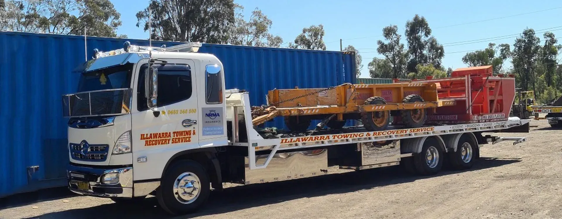 Tow Truck Carrying Improperly Parked Car or Repossessed Vehicle | Shellharbour, Nsw