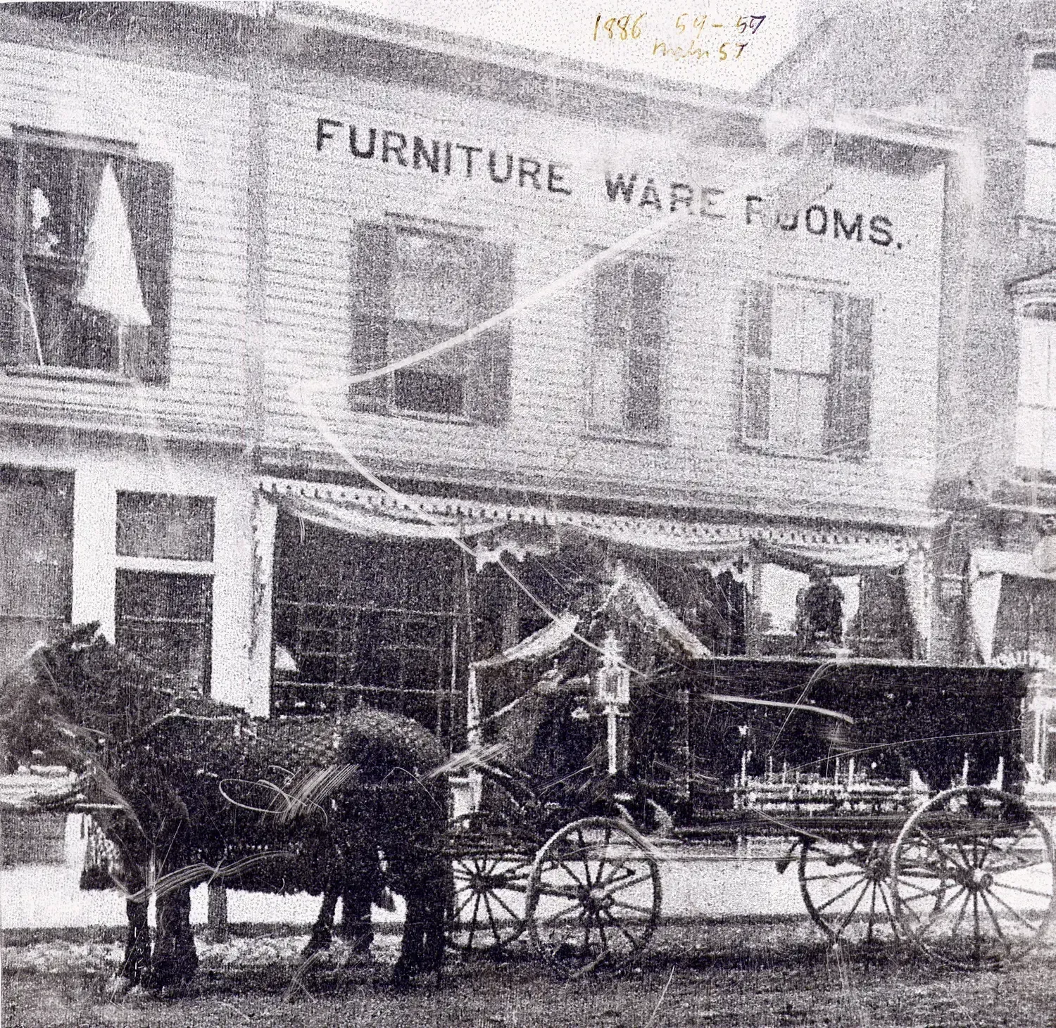 Horse-drawn wagon outside 