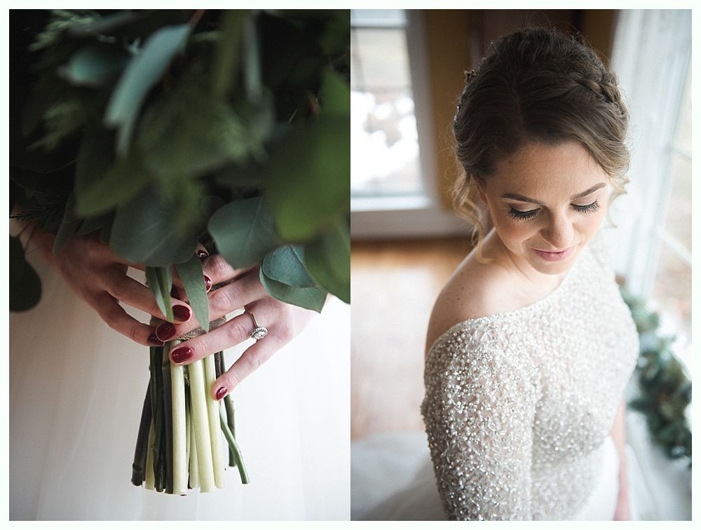 Bride laughs with three bridesmaids in red dresses, holding bouquets.