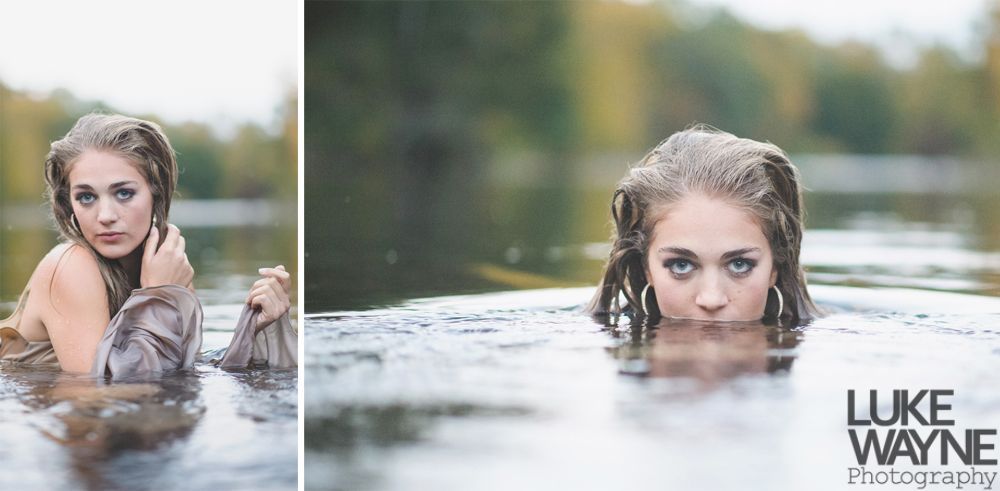 Couple holding hands, smiling; woman in denim jacket, red dress; man in light green shirt, outdoors.