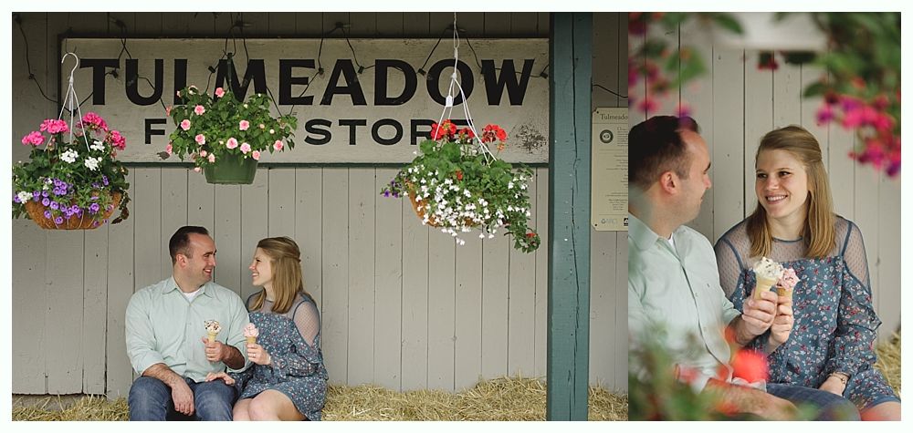 Bride in white dress holding bouquet, standing under weeping willow.