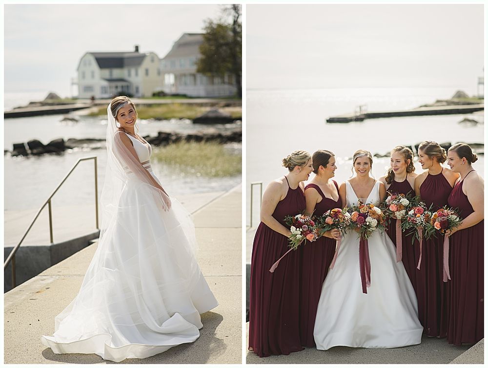 Men in a wooden building, some holding drinks, one toasting. Black and white.