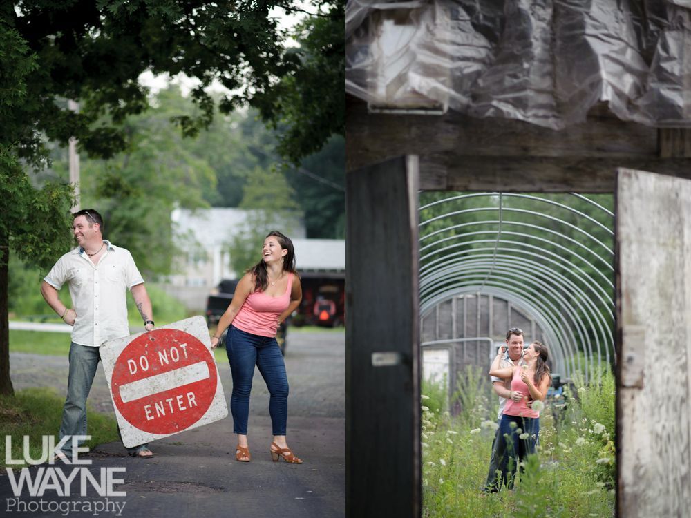 Couple playfully poses: holding a 