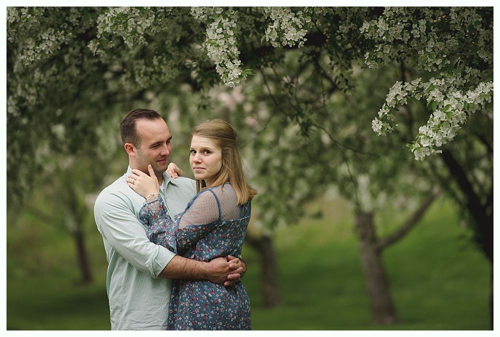 Triptych of wedding reception details: chandelier over table, drink station, and table setting with lights.