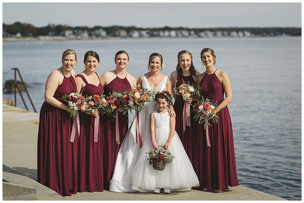 Triptych of wedding reception details: chandelier over table, drink station, and table setting with lights.