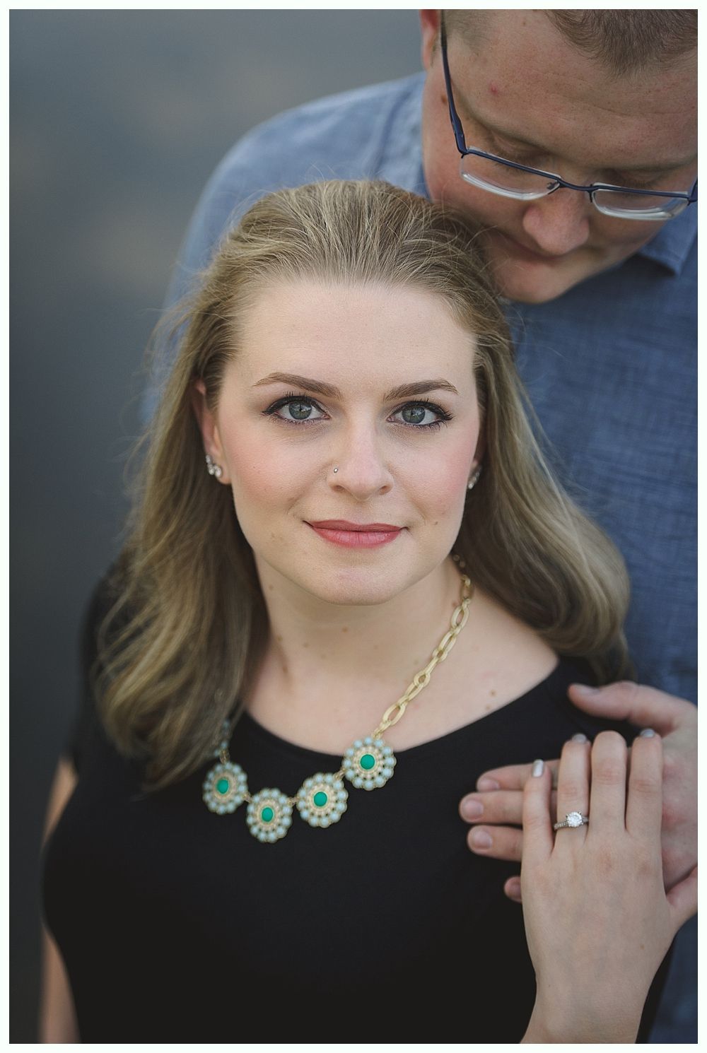 Wedding ceremony: couple at the altar, guests watching. Outdoor setting.