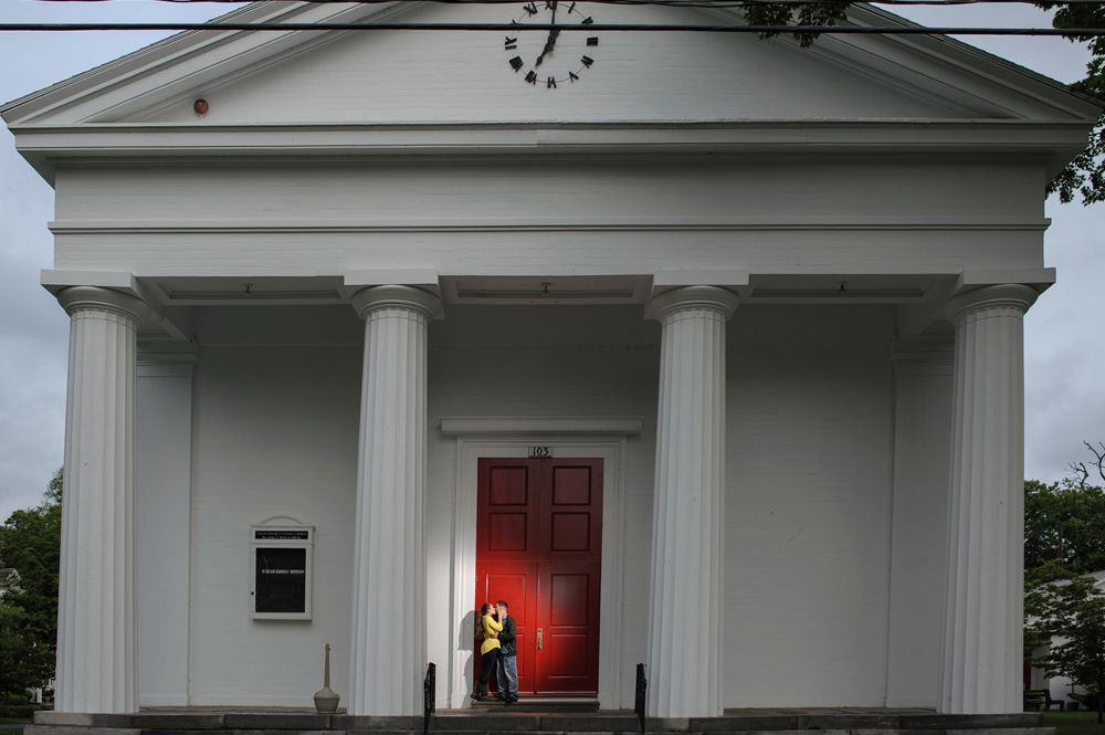 Wedding rings on a leaf, yellow shoes on stairs, and a dress hanging from a tree.