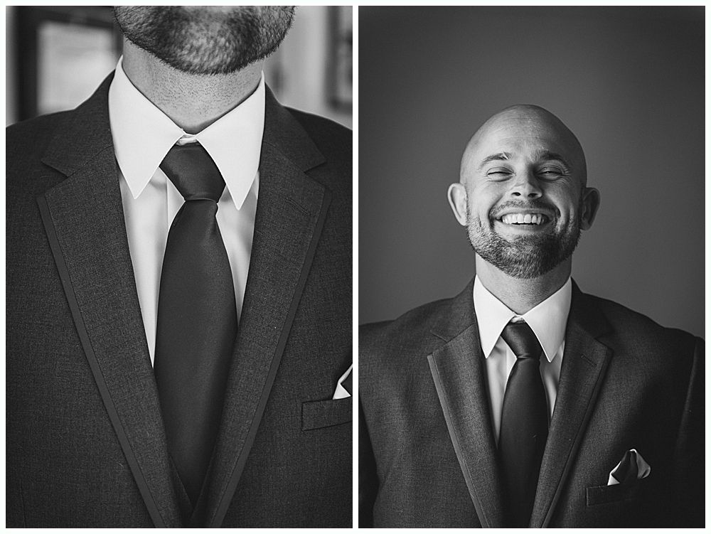 Bride walking with her father down an outdoor aisle; fall trees and guests in background.