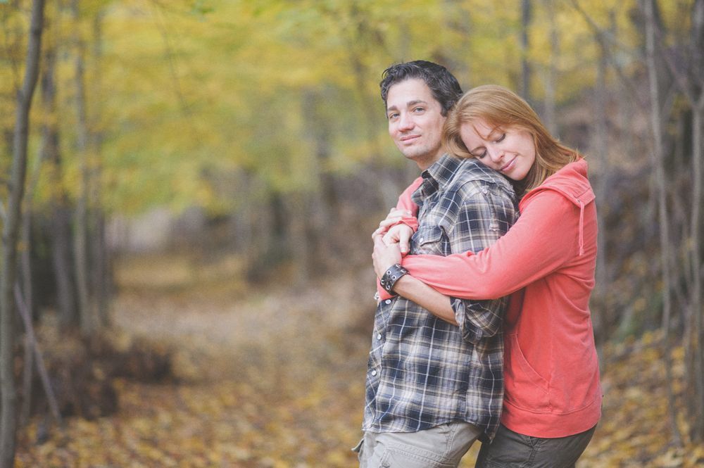 Wedding rings on a leaf, yellow shoes on stairs, and a dress hanging from a tree.