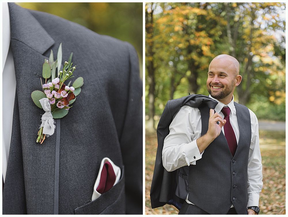 Wedding party walking on a grassy lawn; bride and groom in center, bridesmaids in red, groomsmen in navy.