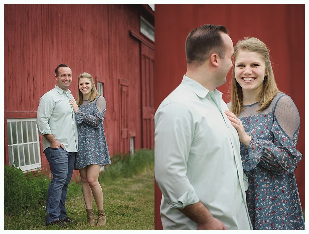 Group of women in white robes, sitting on a couch, smiling and laughing. One woman is being held by others.