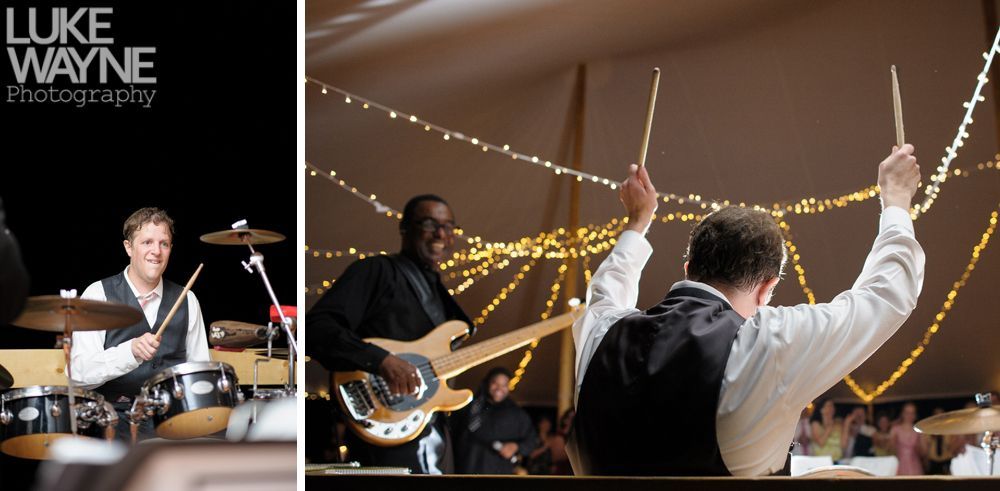 Drummers perform at a venue with string lights. A bassist plays nearby.