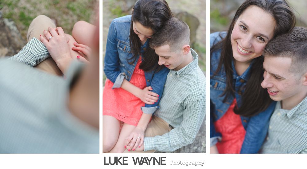 Couple holding hands, smiling; woman in denim jacket, red dress; man in light green shirt, outdoors.