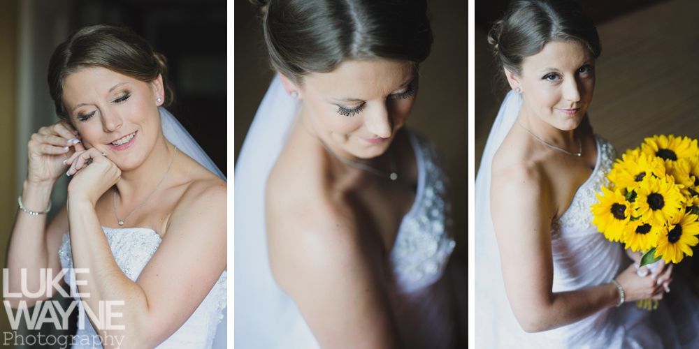 Bride in a white strapless gown adjusts her earring, then smiles holding sunflowers; indoors, window light.