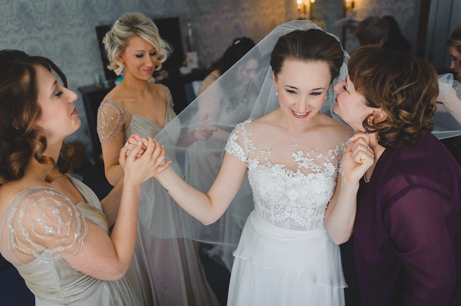 Two photos: smiling couple, man in blue suit, woman in white dress, embracing. Outdoors.