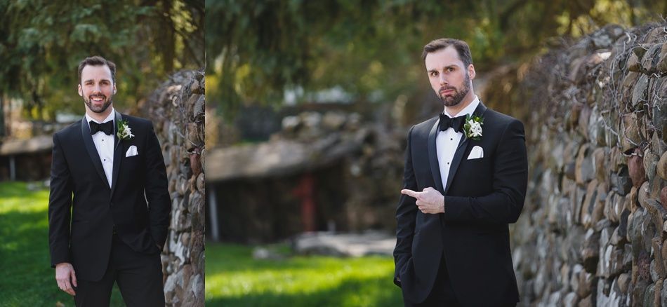 Bride with arms up, making a funny face, groom looking at his hand, cake cutting in background.