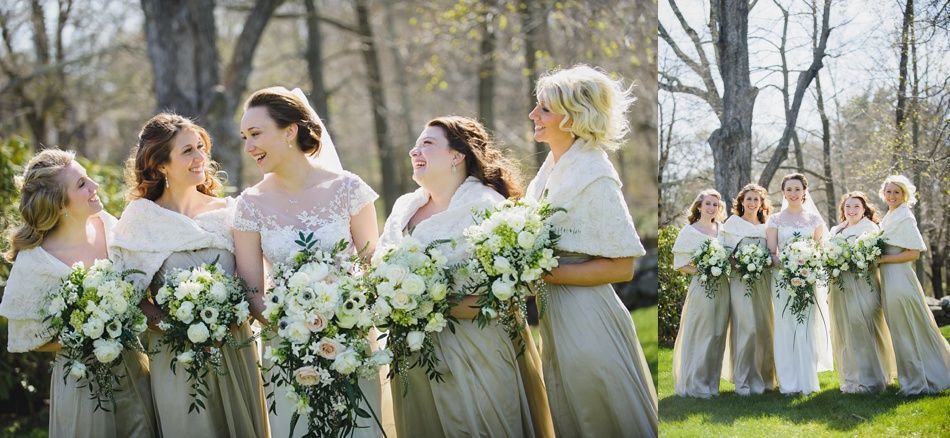 Bride with arms up, making a funny face, groom looking at his hand, cake cutting in background.