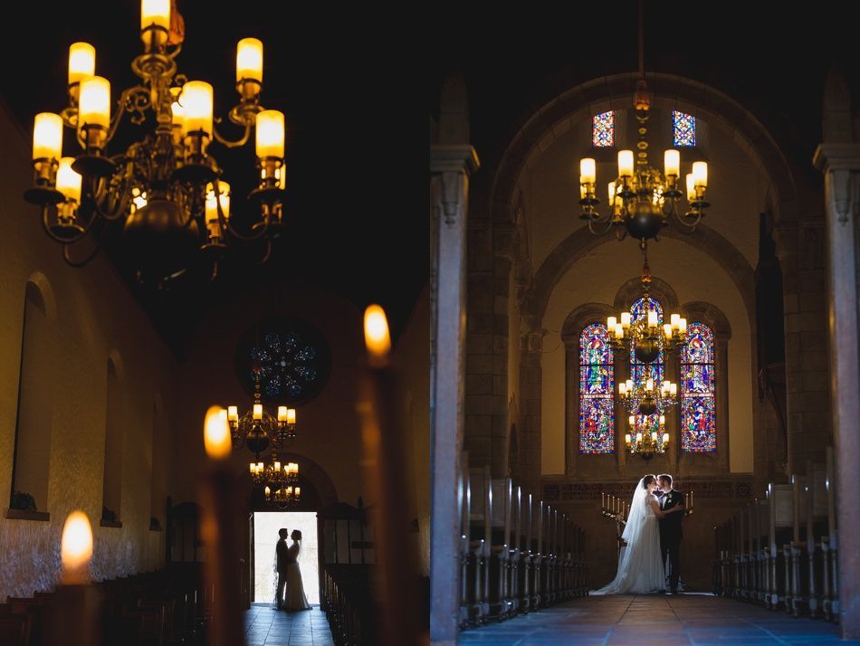 Bride with arms up, making a funny face, groom looking at his hand, cake cutting in background.