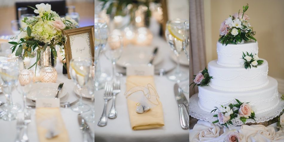 Bride with arms up, making a funny face, groom looking at his hand, cake cutting in background.