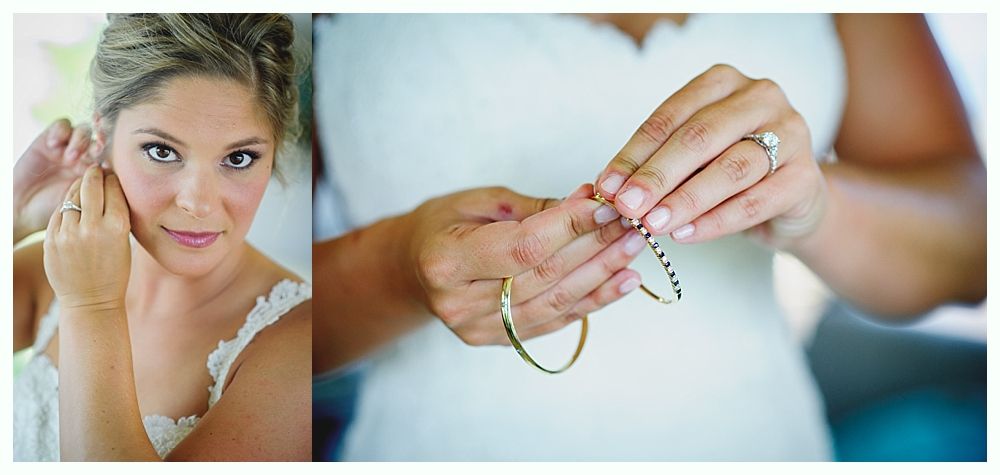 Bride with arms up, making a funny face, groom looking at his hand, cake cutting in background.
