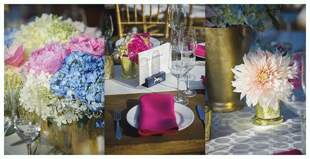 Bride with arms up, making a funny face, groom looking at his hand, cake cutting in background.