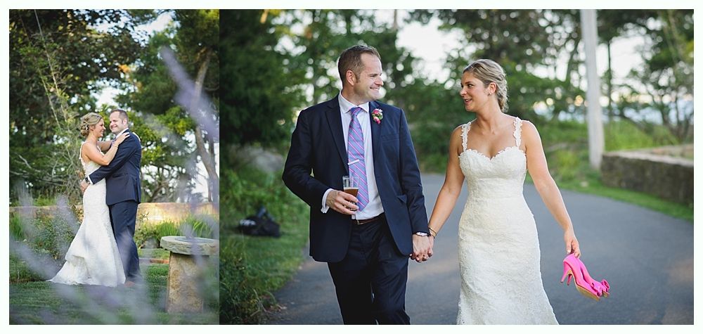 Bride with arms up, making a funny face, groom looking at his hand, cake cutting in background.