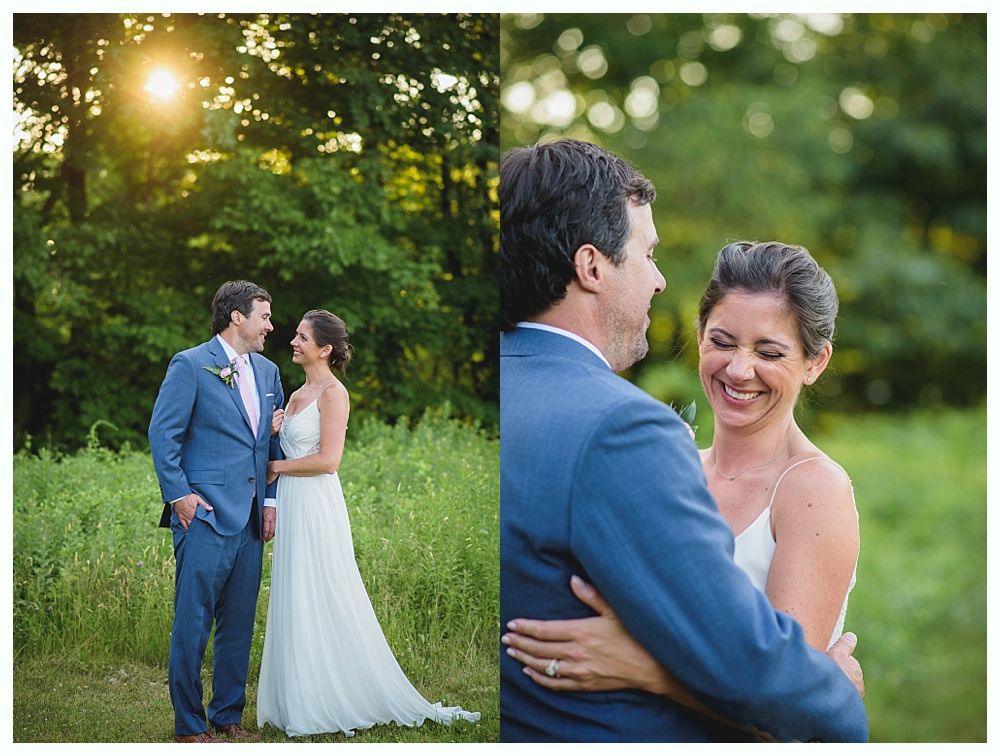 Bride with arms up, making a funny face, groom looking at his hand, cake cutting in background.