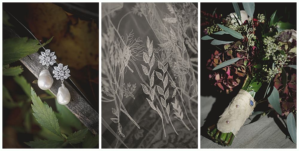 Wedding details: Earrings, veil with floral embroidery, and bouquet with dark red flowers.