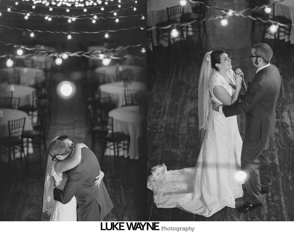 Wedding party poses on a road under blue sky, bride in white gown, bridesmaids in teal.