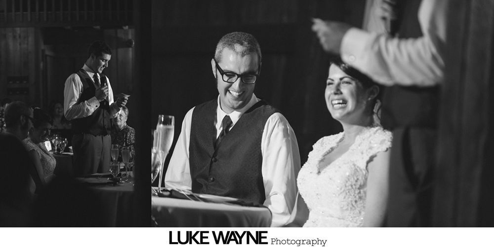 Wedding ceremony with couple, wedding party, and guests outdoors on a grassy lawn with trees and blue sky.