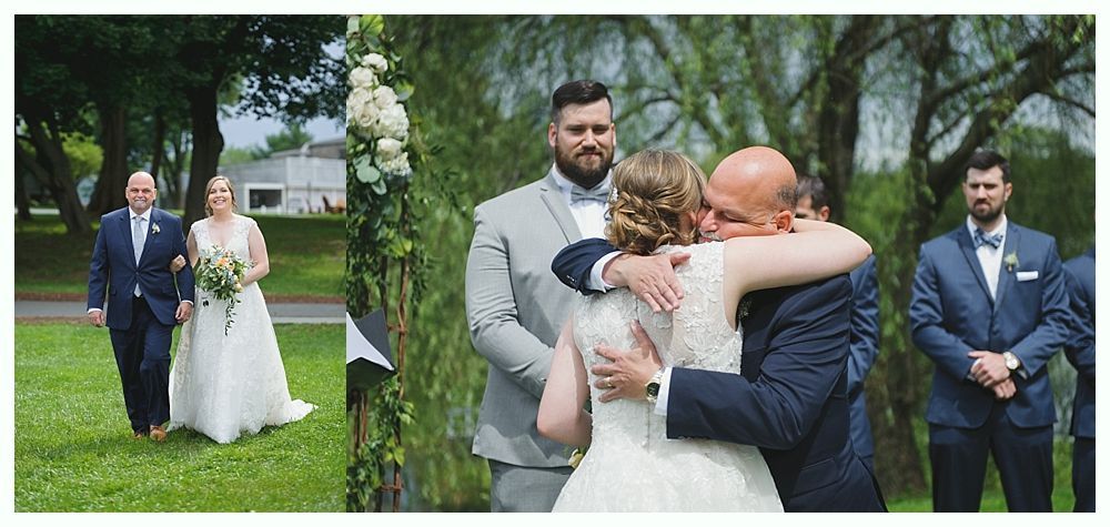 Bride walks down the aisle with her father, who later hugs her. Groom watches during ceremony.