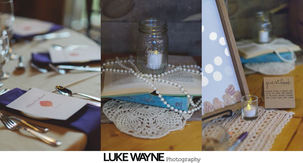 Bride and groom dance at a wedding reception with guests clapping in the background under warm lighting.