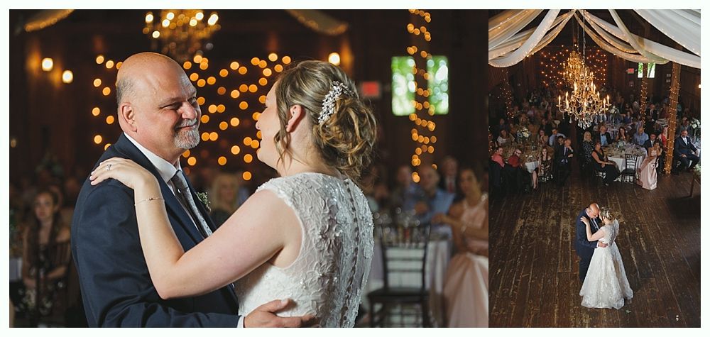 Bride and groom dancing at a wedding reception; a string of lights in the background.