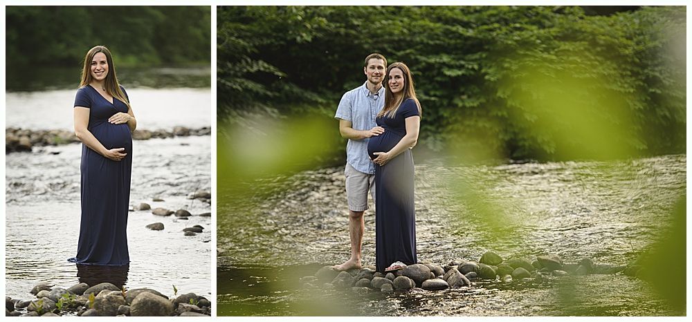 Pregnant woman in blue dress stands in a river, joined by a man. They both hold her belly.