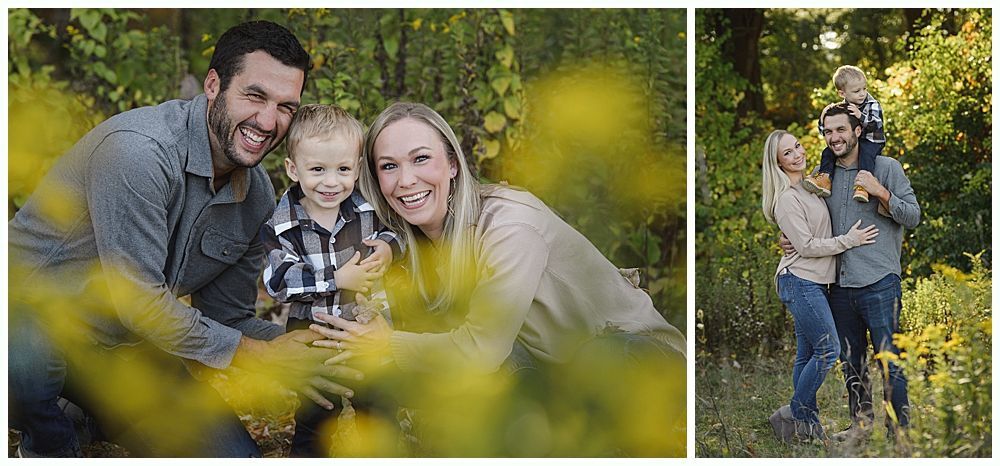 Parents kissing the heads of their smiling child. Outdoors, soft focus with green foliage.