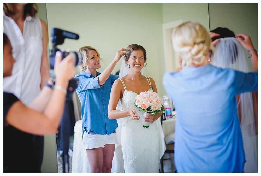 Two photos: smiling couple, man in blue suit, woman in white dress, embracing. Outdoors.
