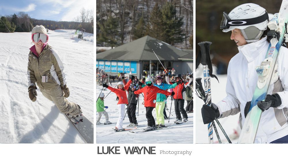 Couple in wedding attire embrace by open school bus door under a sunny sky.