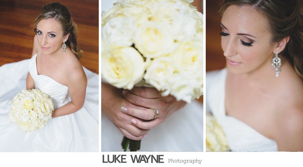 Wedding reception details: cake, flowers, wine, purple and white decor.
