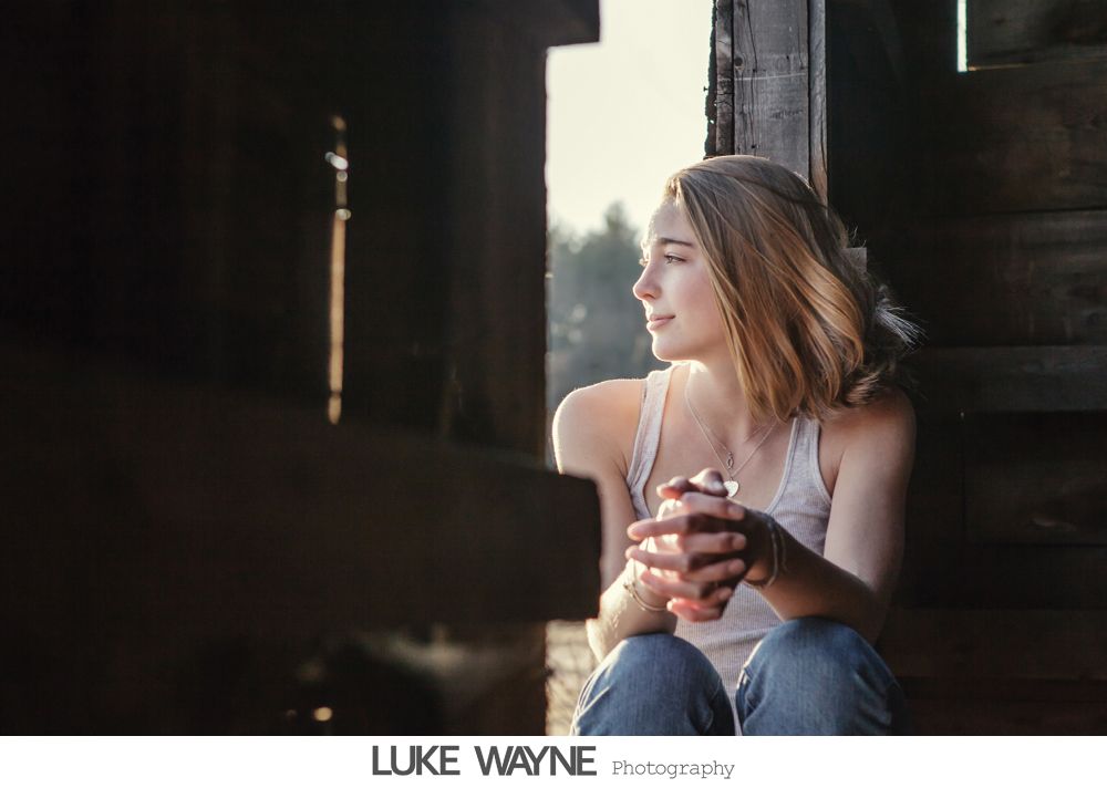 Wedding reception details: cake, flowers, wine, purple and white decor.