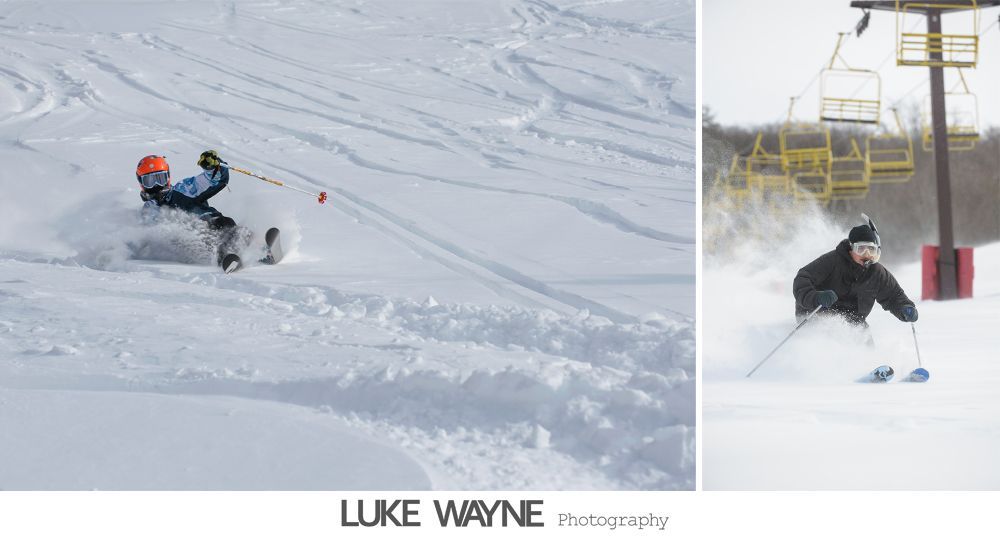 Wedding reception details: cake, flowers, wine, purple and white decor.