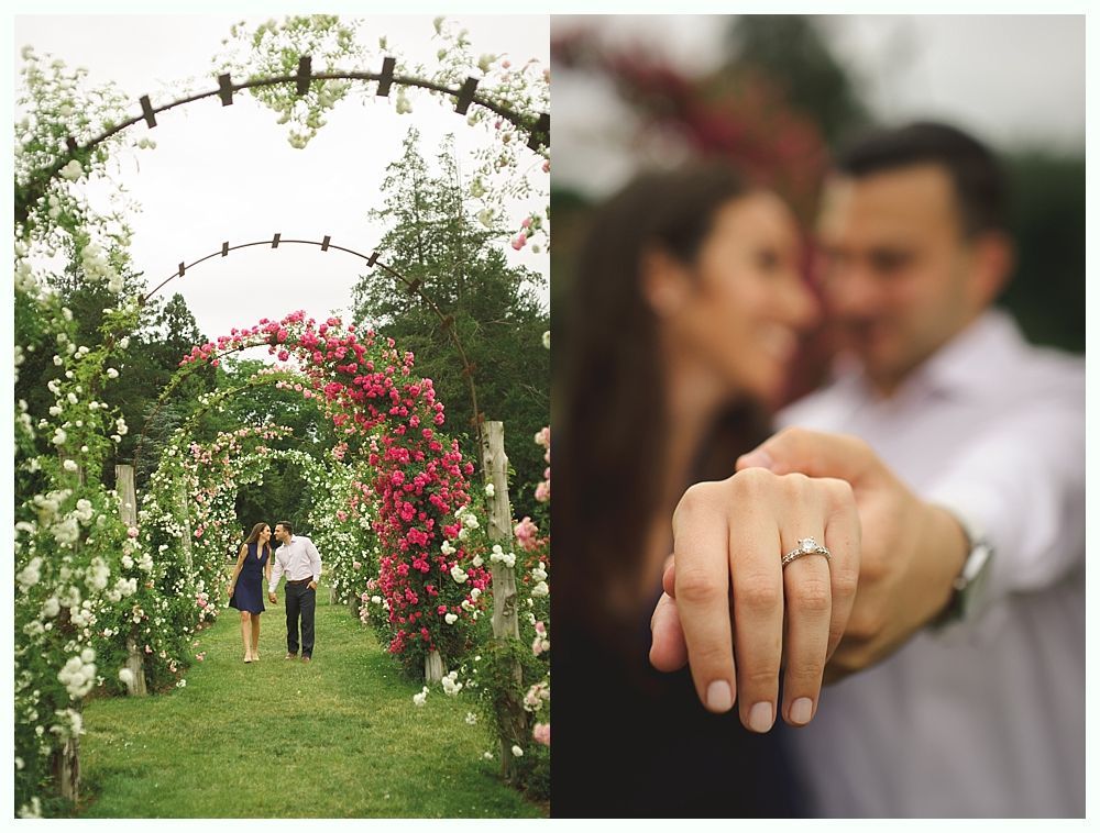 Bride in a white dress on a bridge, holding a bouquet, with a house in the background.