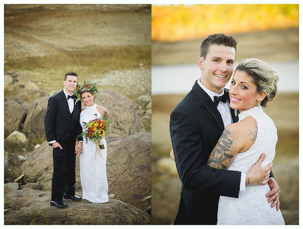 Wedding couple, man in tuxedo, woman in white dress, embracing outdoors, smiles.