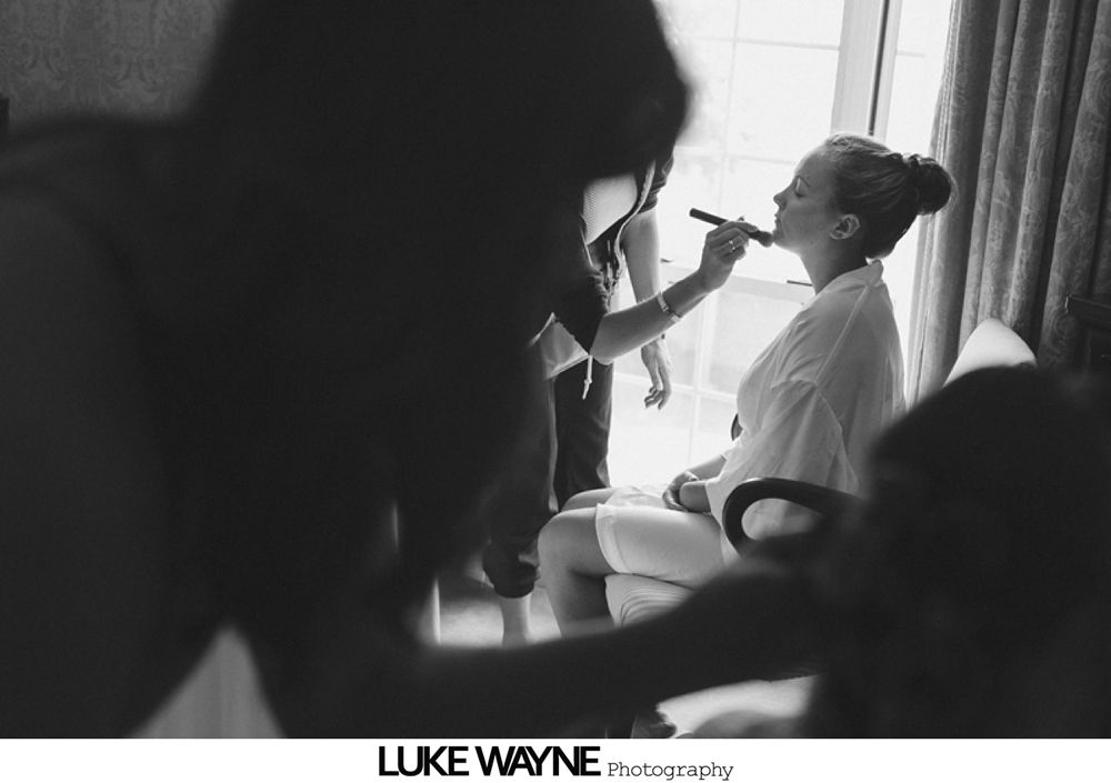 Two wedding rings on a weathered green book.